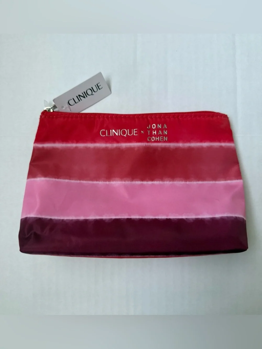 Clinique x Jonathan Cohen Zip Top Cosmetic Bag Red to Pink Ombre Striped